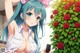 Anime girl with blue hair and a pink bow holding a cell phone.